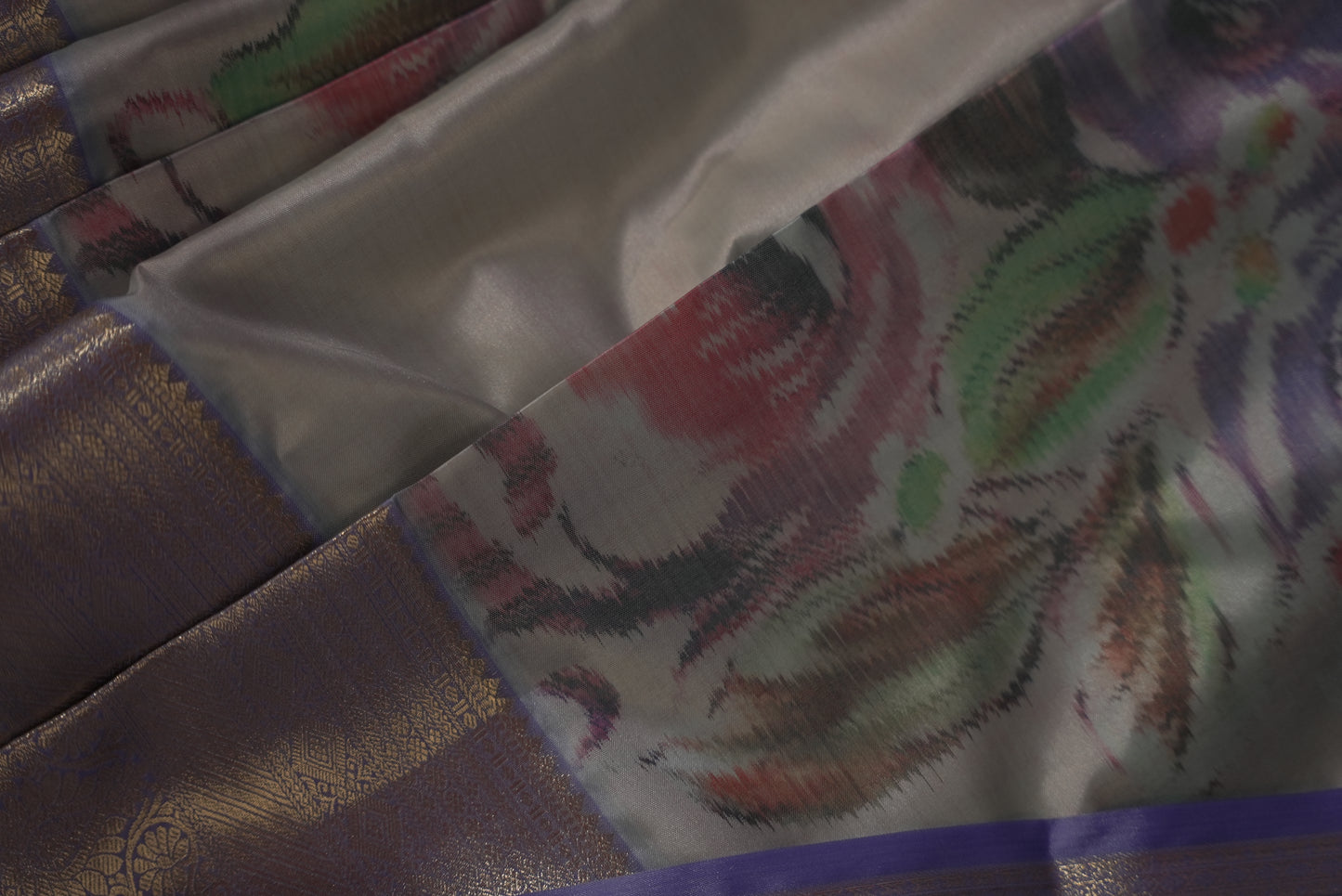Close-up of a fabric with intricate patterns and colors