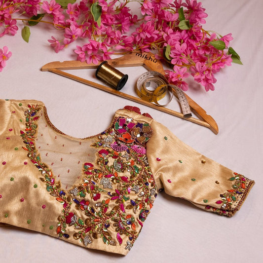 Creme color blouse with multicolour handwork