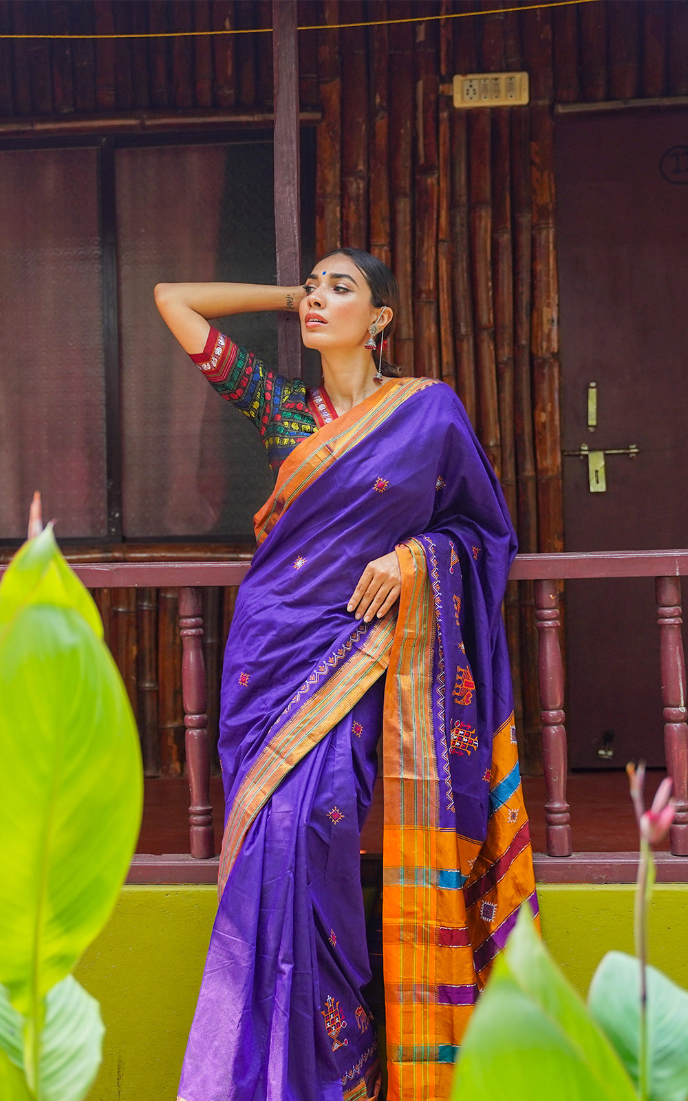 Violet saree golden orange border